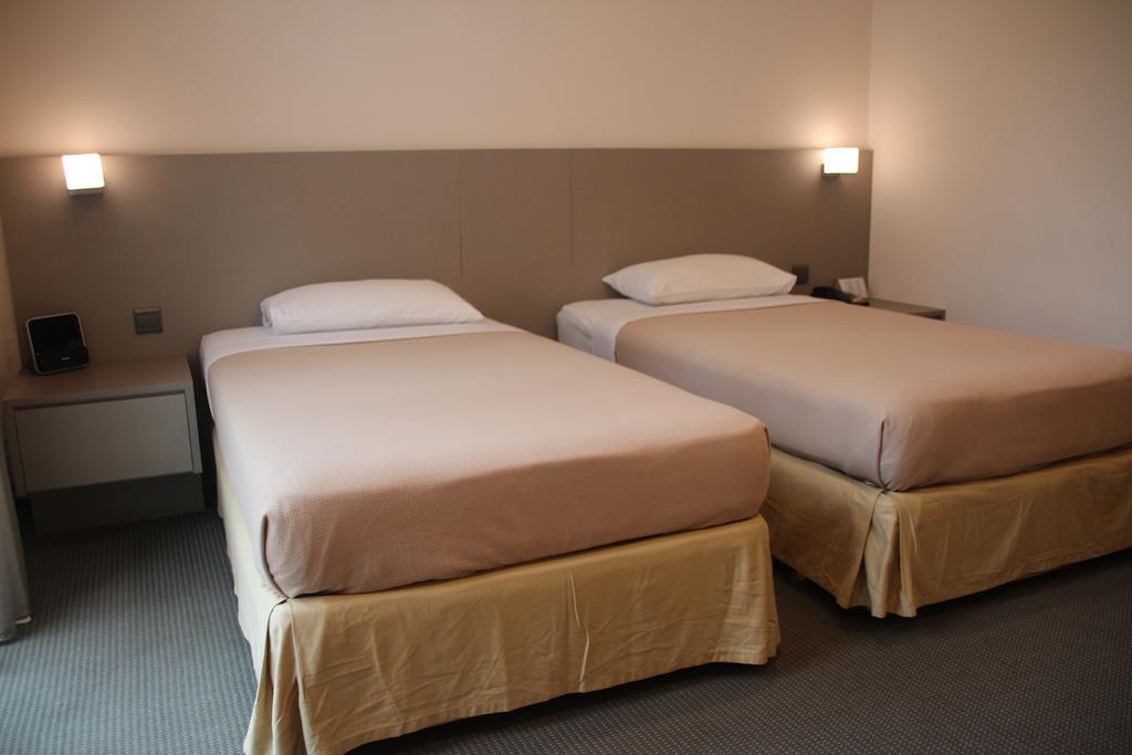 Classique Hotel Singapur Oda fotoğraf